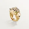 Panthere De Cartier Ring – Yellow Gold, Lacquer, Tsavorite Garnet, Onyx – Cartier